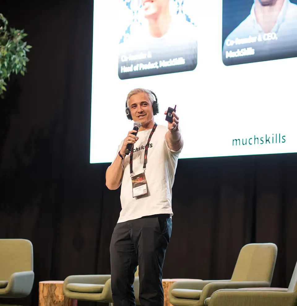 Daniel Nilsson presenting MuchSkills on stage at Tech BBQ